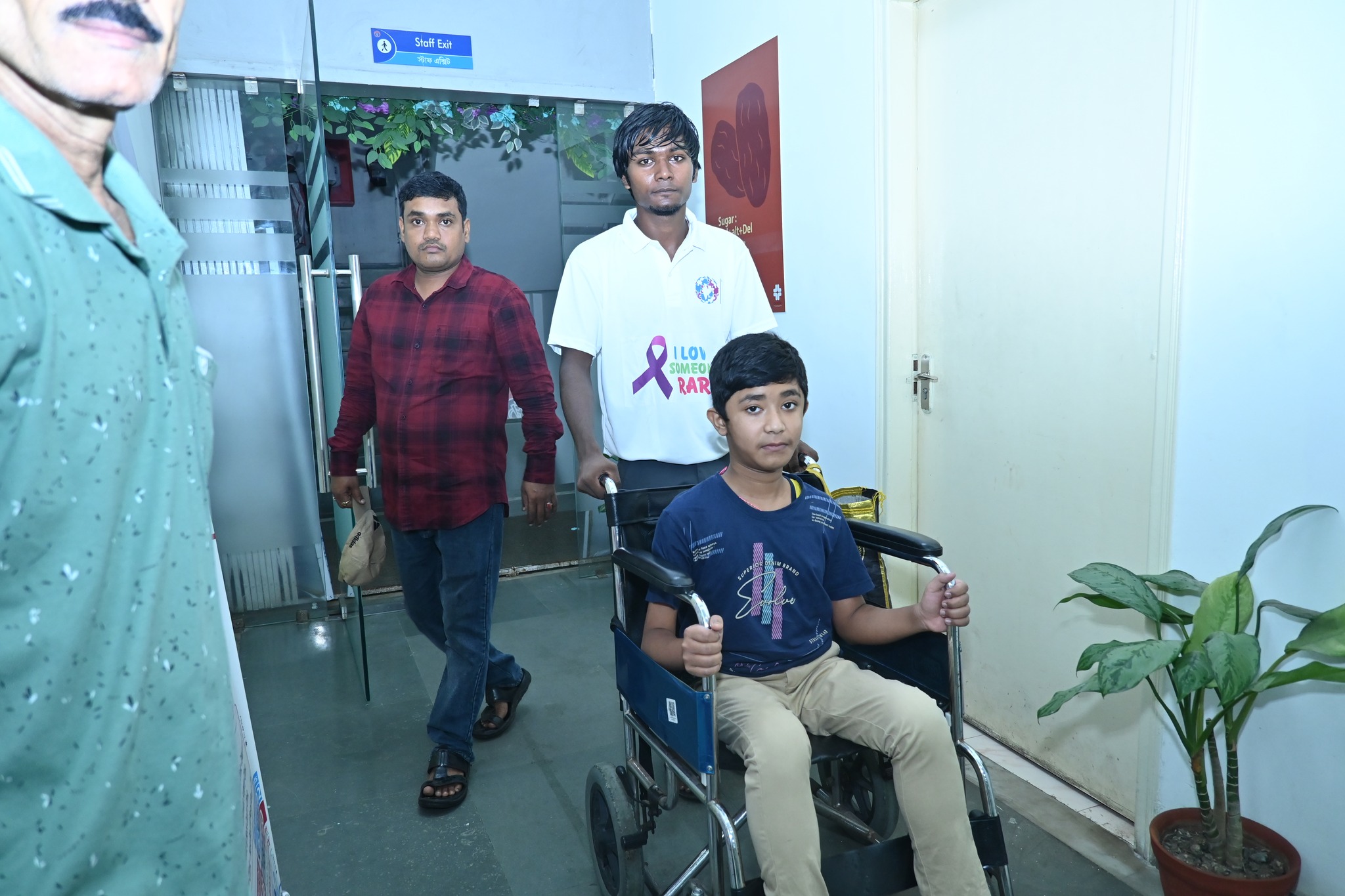 Attendees wearing ribbons to show support for rare diseases.